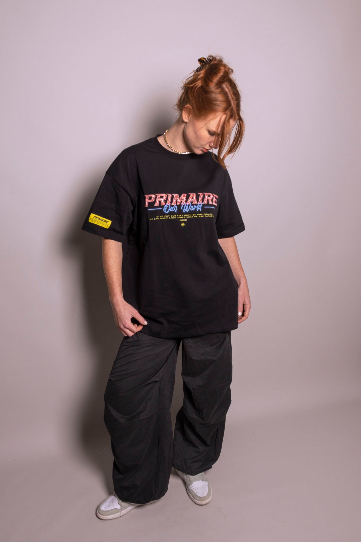 ‘Our world’ black tee