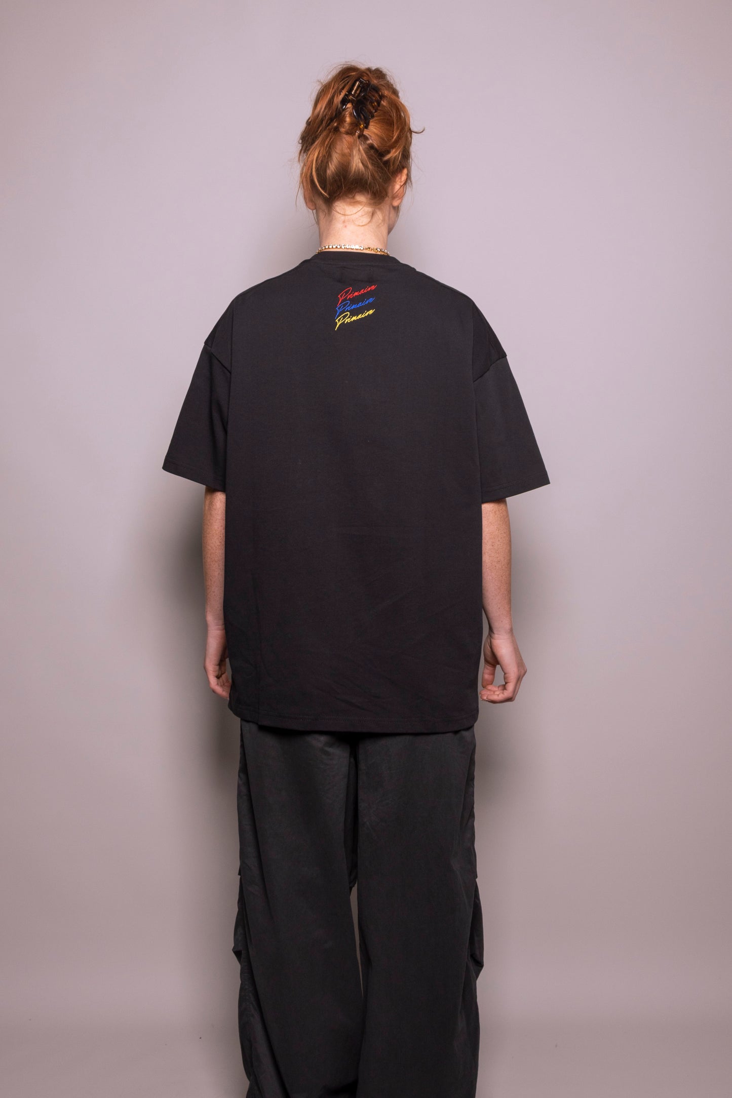 ‘Our world’ black tee