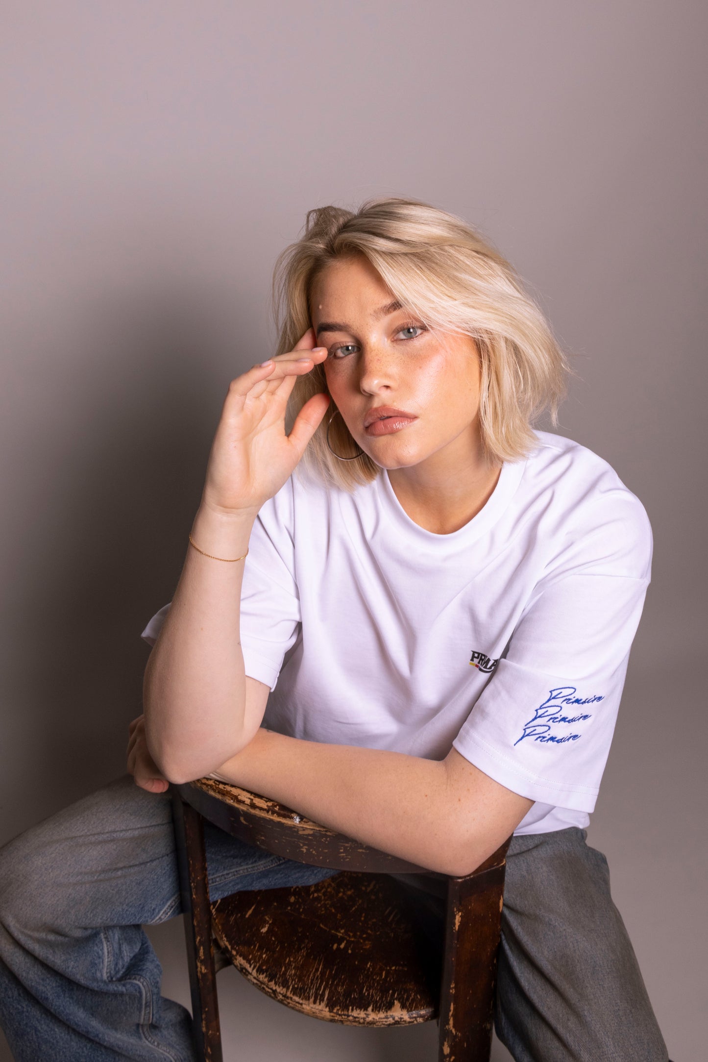 ‘Our world’ white tee